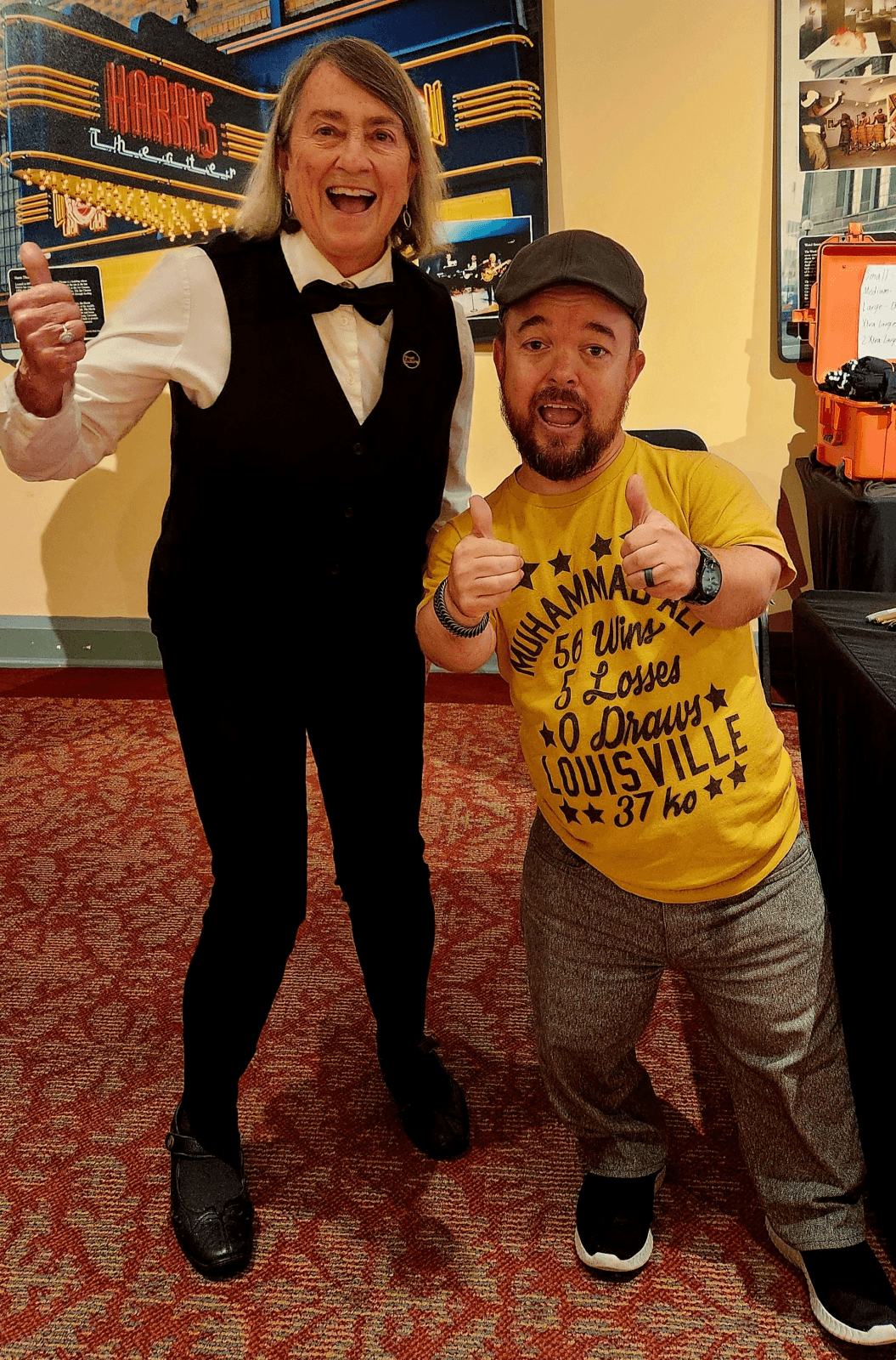 Volunteer usher pose with comedian Brad Williams