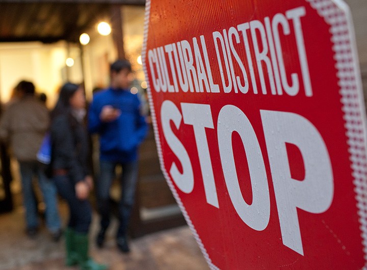 red stop sign with text reading 'cultural district stop'