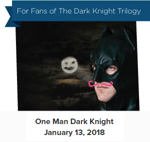 Blue ribbon with text: For Fans of the Dark Knight Trilogy with image of man dressed in Batman costume