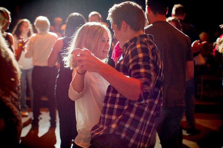 two dancers in a crowd