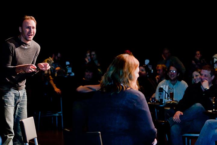 audience laughing at improv comedy show