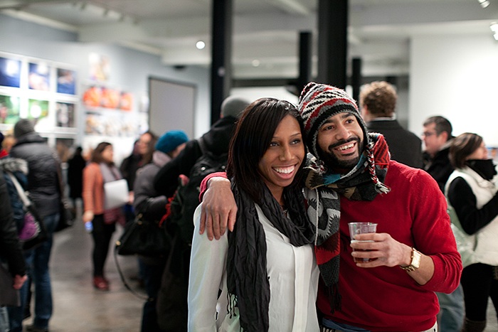 a couple enjoys a work of art together at a gallery in Pittsburgh