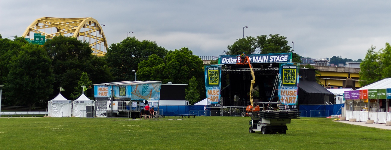 the dollar bank main stage being assembled in point state park