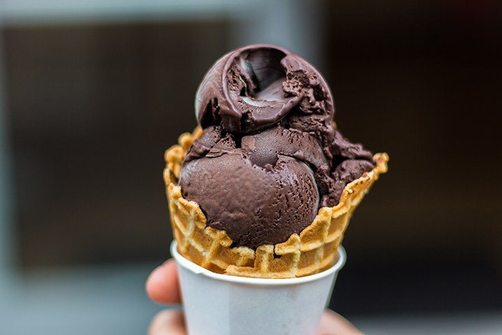 an ice cream cone with chocolate ice cream