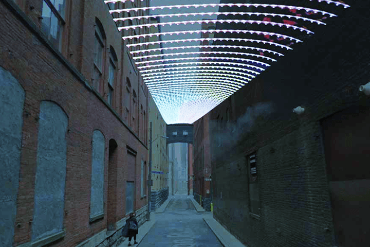 Garrison Canal, an overhead light installation, illuminates Garrison Place