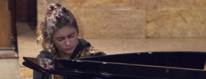 Musician Irene Monteverde plays the piano