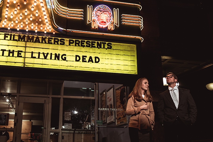 our versions of Johnny and Barbara stand outside the Harris Theater