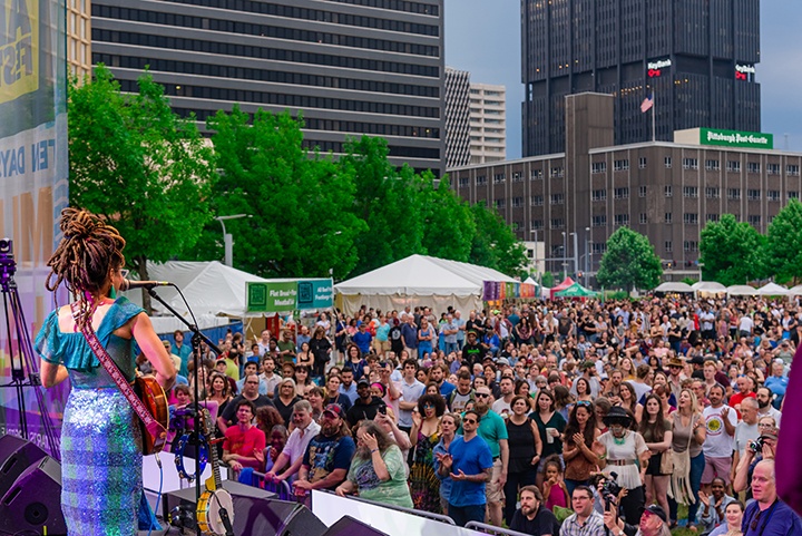 a wide shot of concertgoers at the three rivers arts festival