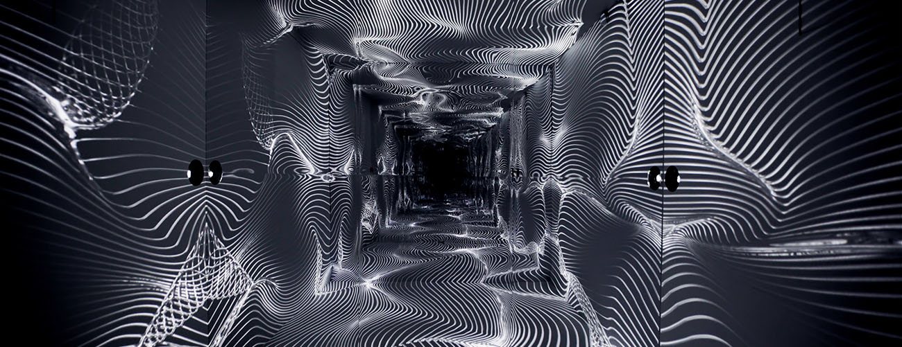 White light projections on a black wall