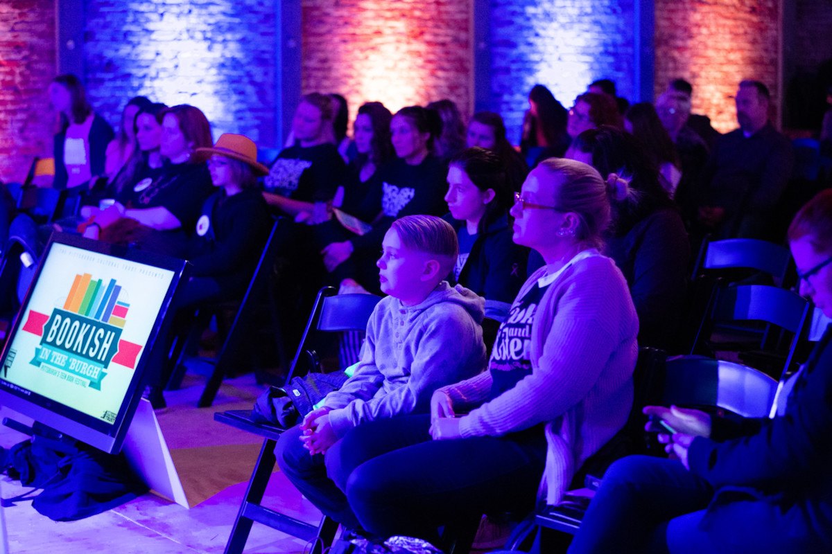 crowd of teens and parents listen attentively Bookish in the 'Burgh