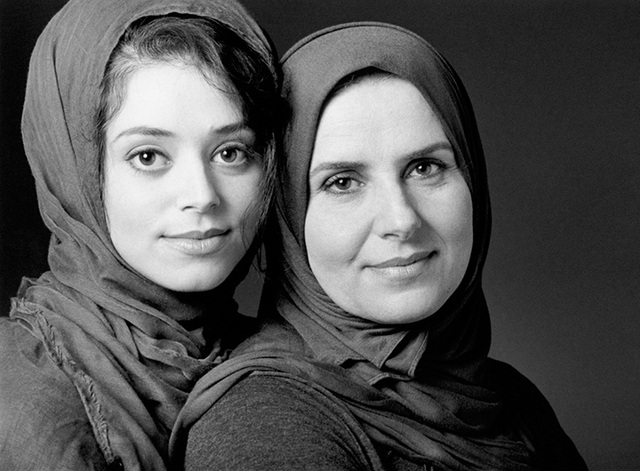 a photo from the we are all related exhibition showing a portrait of two women in headscarves