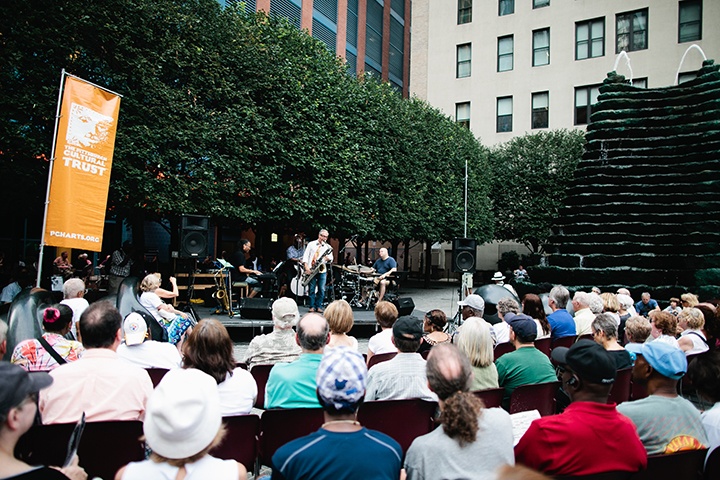an audience listens to a jazzlive concert in katz plaza