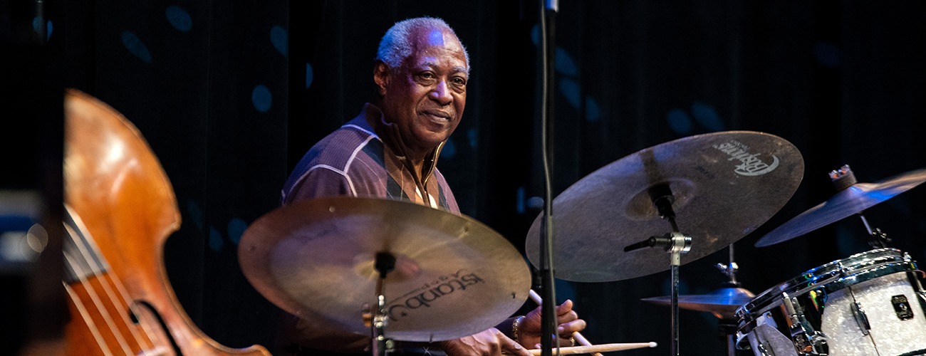 Roger Humphries playing drums at this year's JazzLive 15th Anniversary Celebration