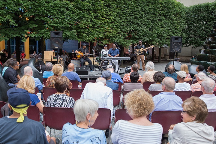 a crowd watches a jazzlive concert in katz plaza