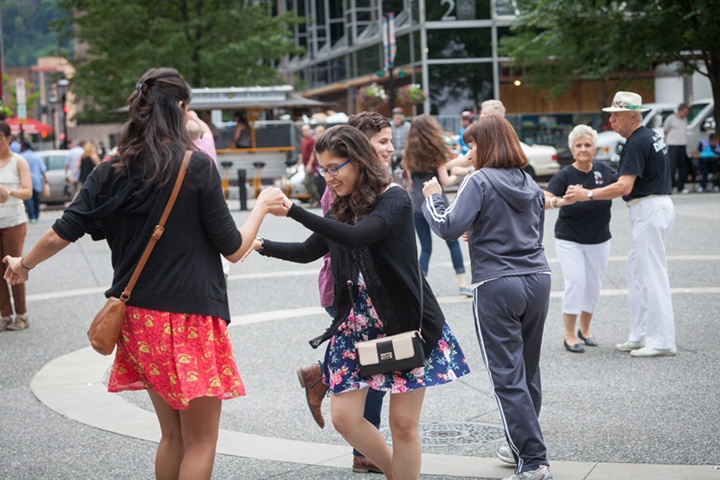 people dancing in downtown Pittsburgh's Market Square