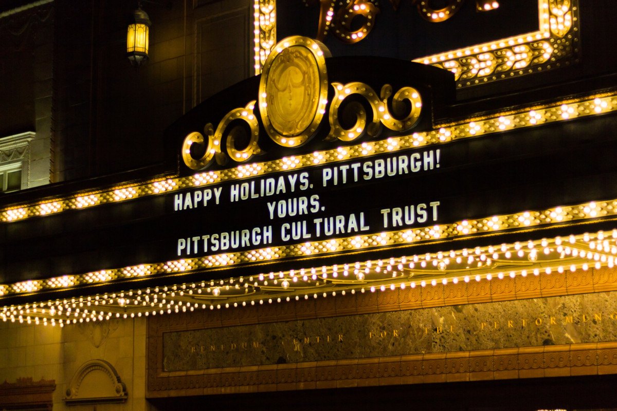 benedum center marquee lit up with message happy holidays, pittsburgh. yours, pittsburgh culutral trust