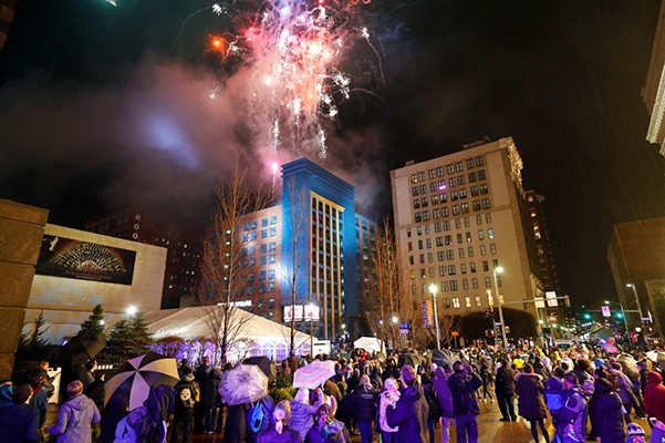 crowds watch the opening fireworks at Highmark First Night Pittsburgh