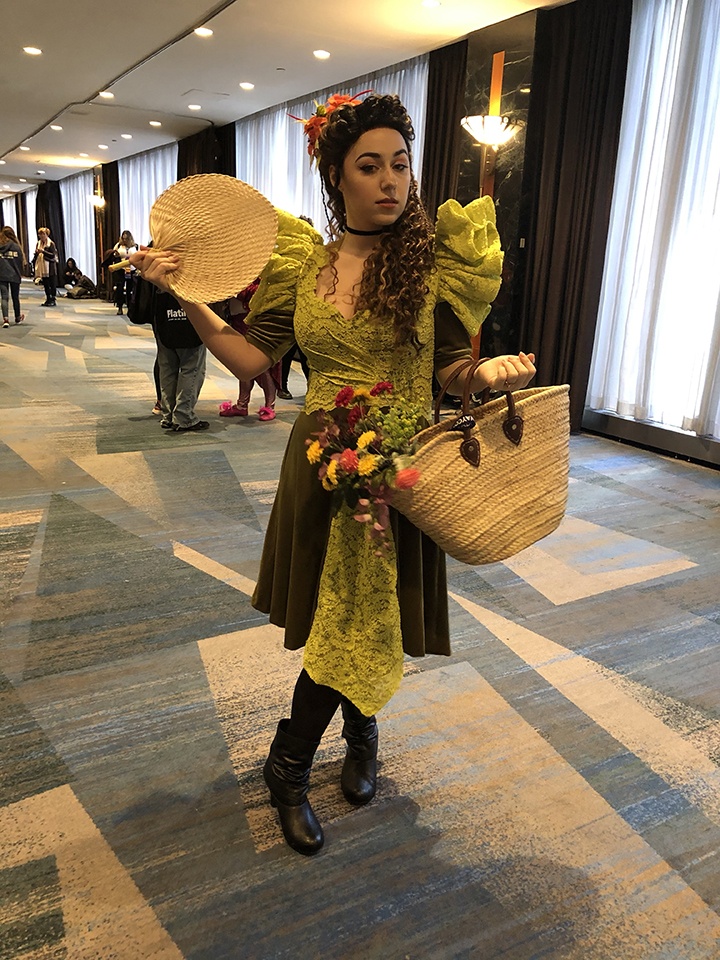 a person dressed as persephone from hadestown