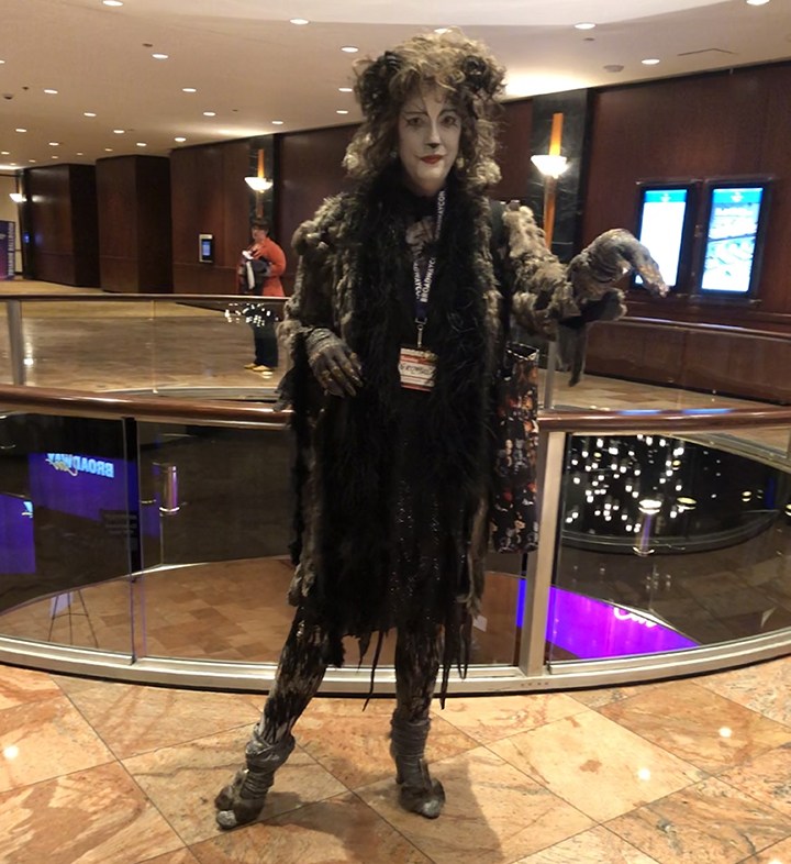 a person dressed as a character from cats