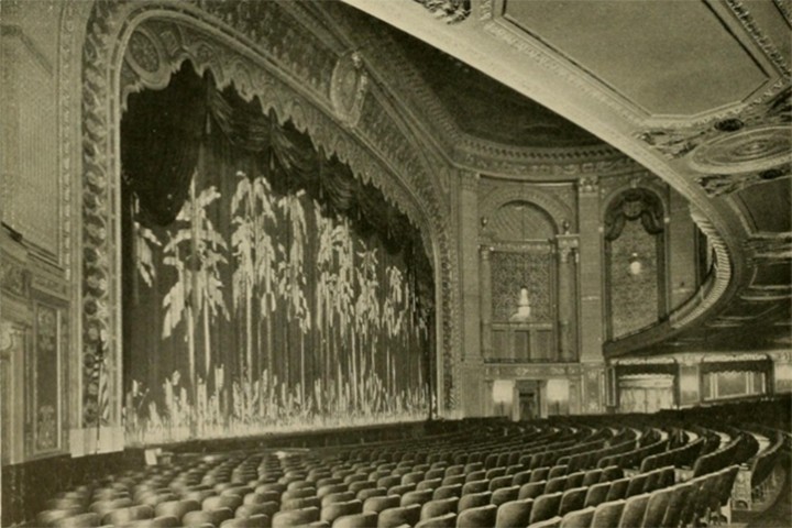 a black and white photo of the auditorium and stage at the stanley theater in 1928, shortly after it opened