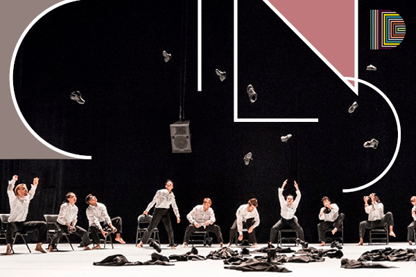 a group of dancers from Hubbard Street Dance Chicago throw their hats in the air