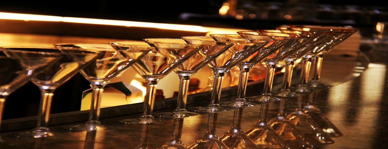 martini glasses on top of the bar at Olive or Twist located Downtown Pittsburgh