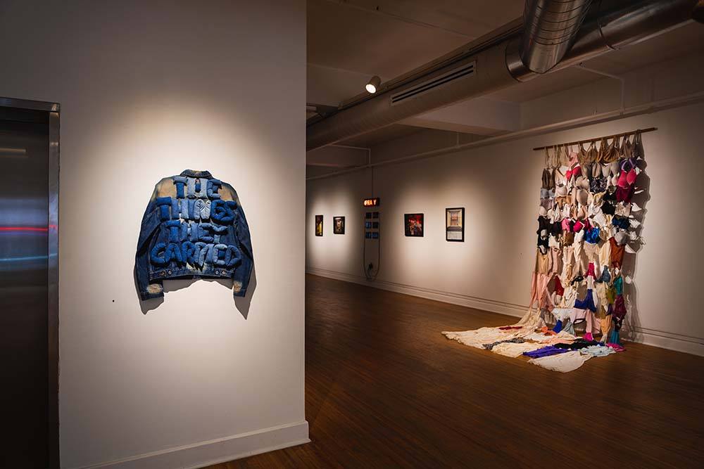 Two fabric pieces, one made out of denim and one made out of women's undergarments
