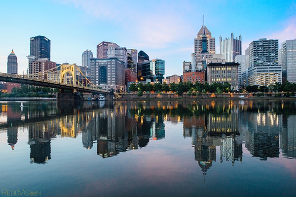 the pittsburgh skyline at sunrise