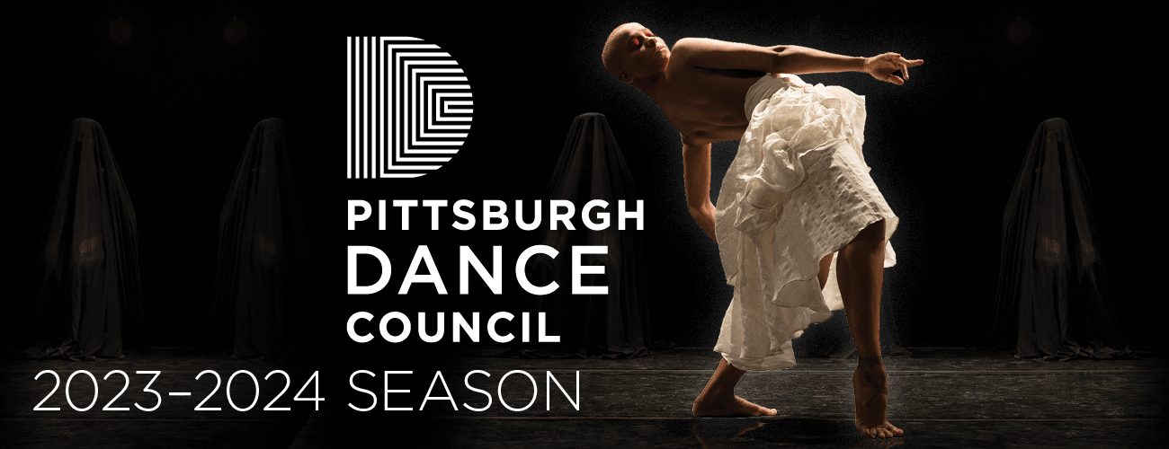 dancer flipped upside down on the ground with one foot up in the air, toes pointed  Pittsburgh Dance Council 2022-2023 50th Anniversary Season