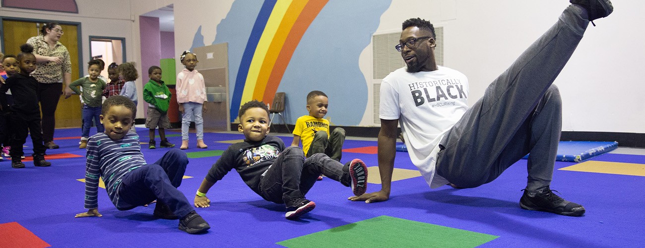 teacher interacting with pre-k kids